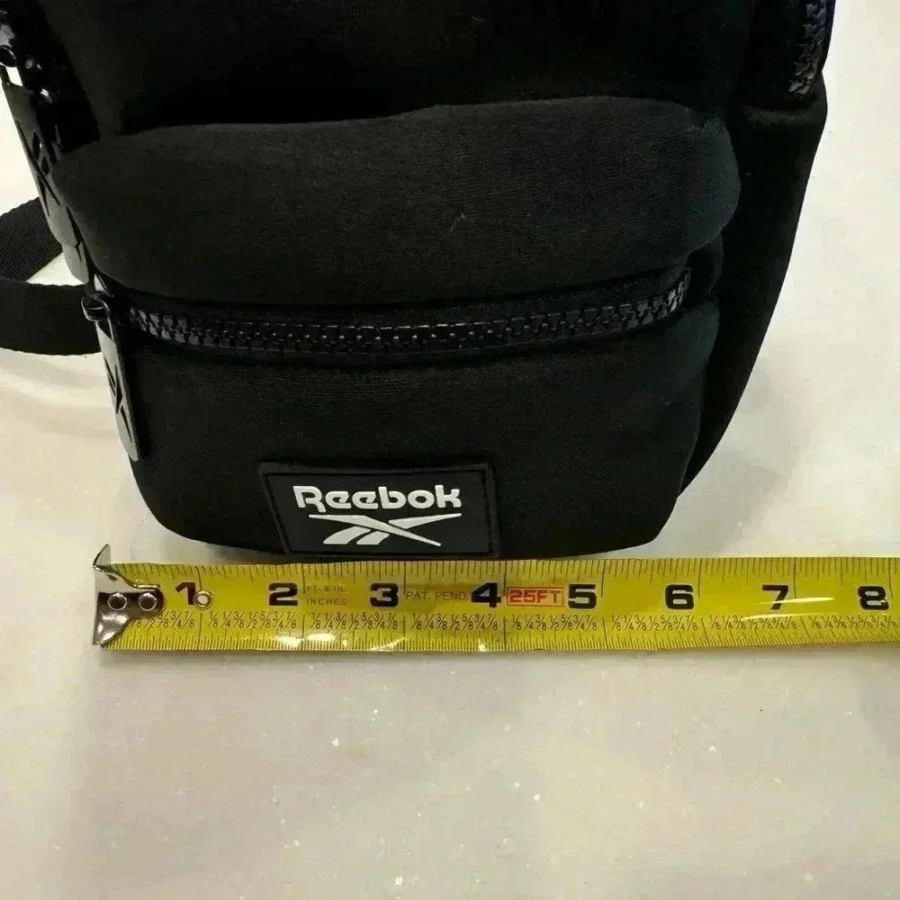 Reebok mini neoprene back pack adjustable straps front zip compartment